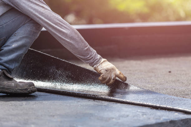 Professional Basement Waterproofing technician working in Gaines, MI